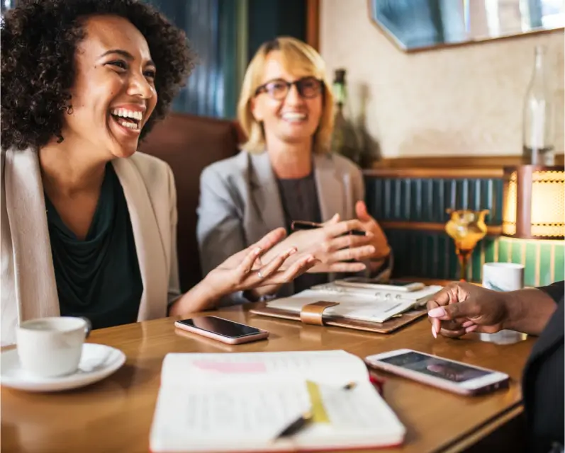 people meeting and laughing